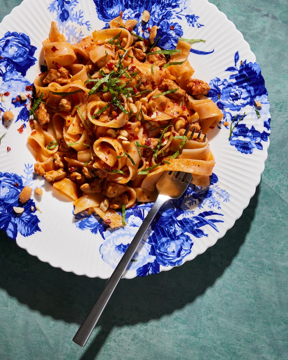 spicy chicken noodles on a plate