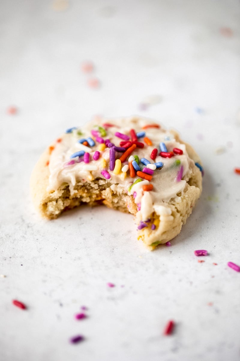 healthy birthday cake cookie with a bite taken out