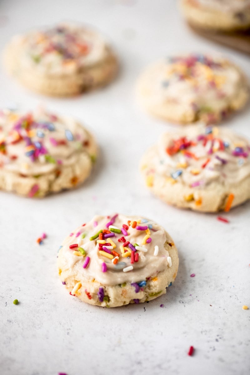 healthy birthday cake cookies on a grey board