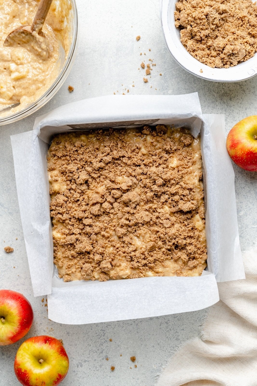 unbaked apple coffee cake in a pan