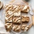 apple coffee cake sliced on parchment paper