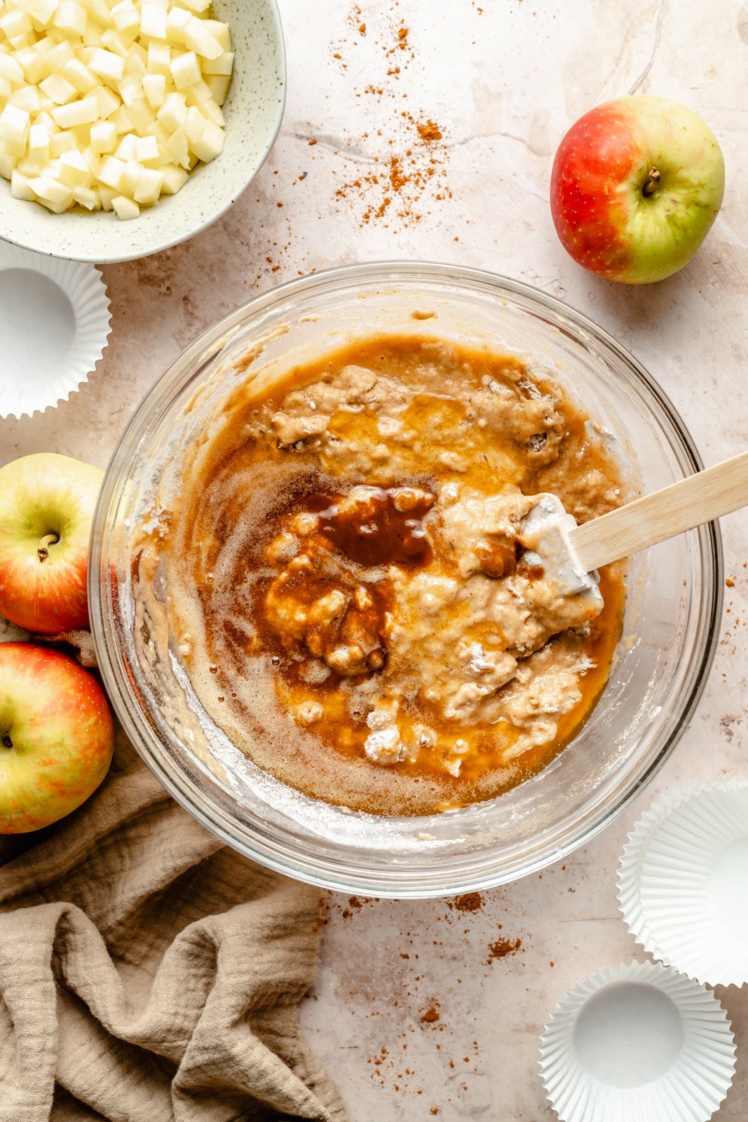 mixing batter for brown butter apple muffins