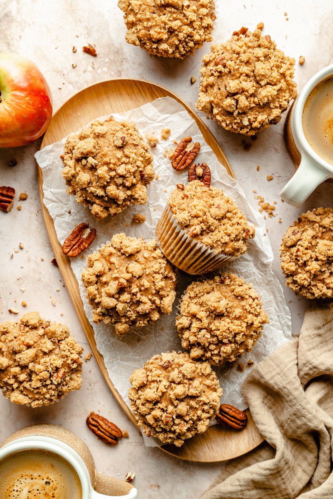 homemade apple muffins on parchment paper