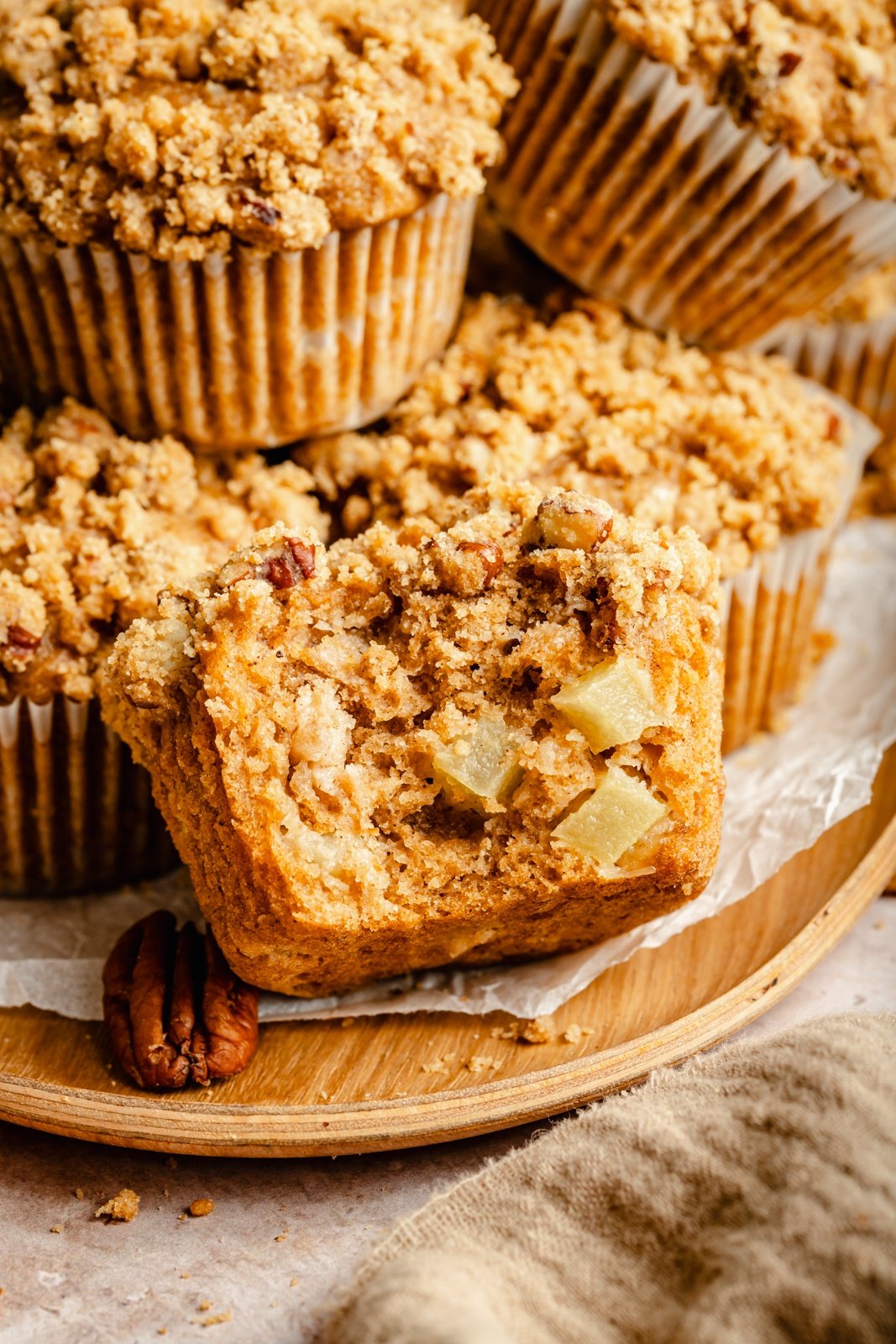 brown butter apple muffin with a bite taken out