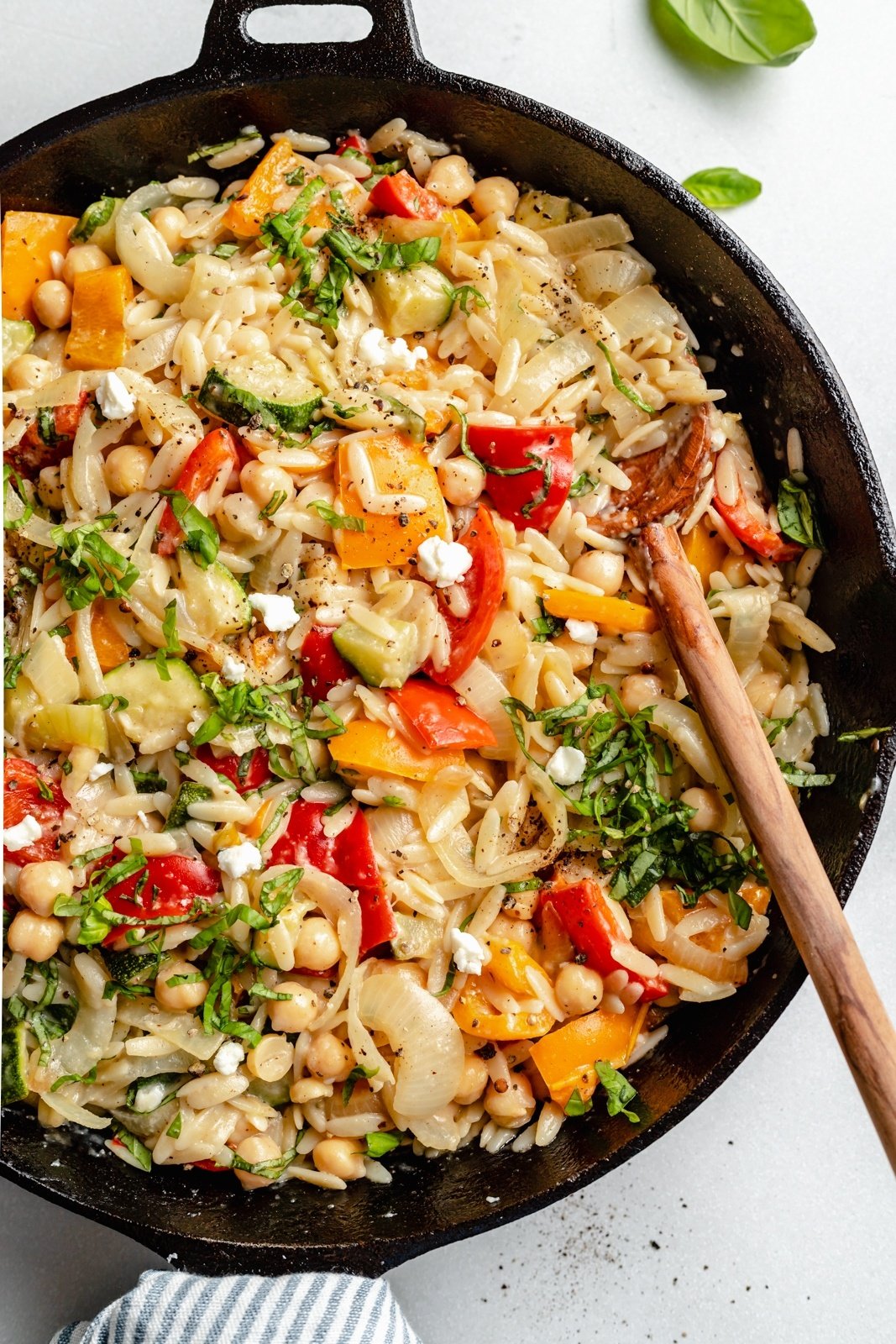 grilled vegetable orzo in a skillet