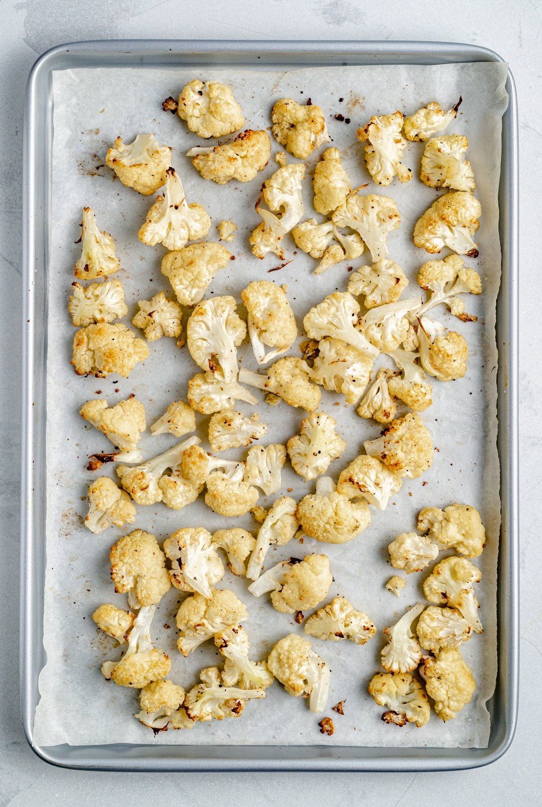 roasted cauliflower on a baking sheet