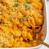 buffalo cauliflower mac and cheese in a baking dish with a spoon