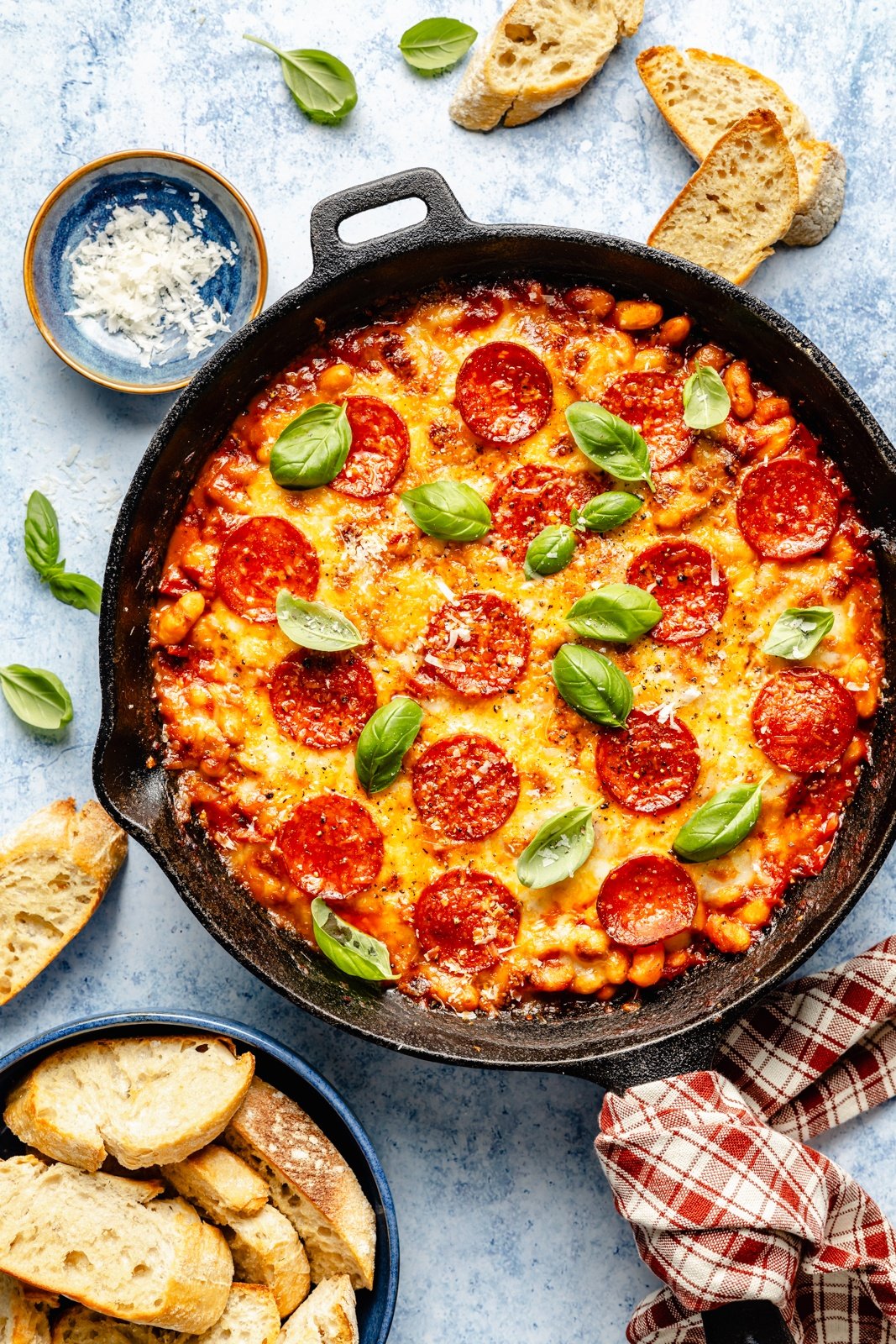 cherry tomato pepperoni white bean bake in a skillet