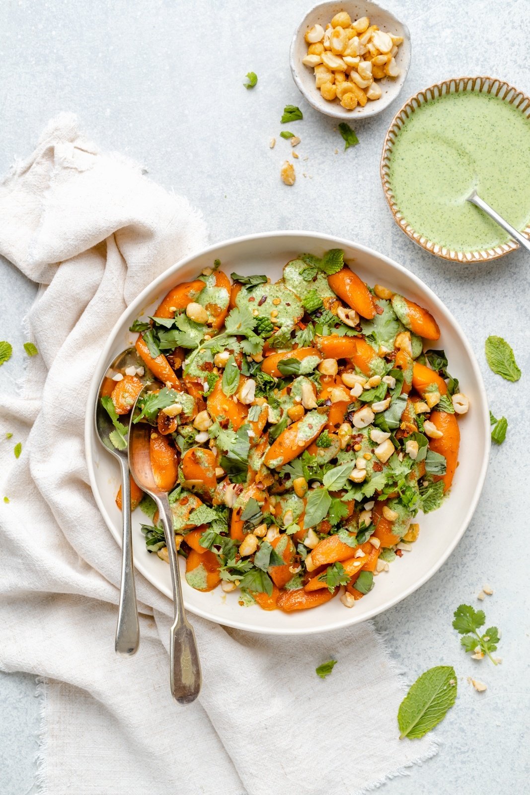 vegetarian caramelized carrots with spicy cilantro yogurt sauce in a bowl