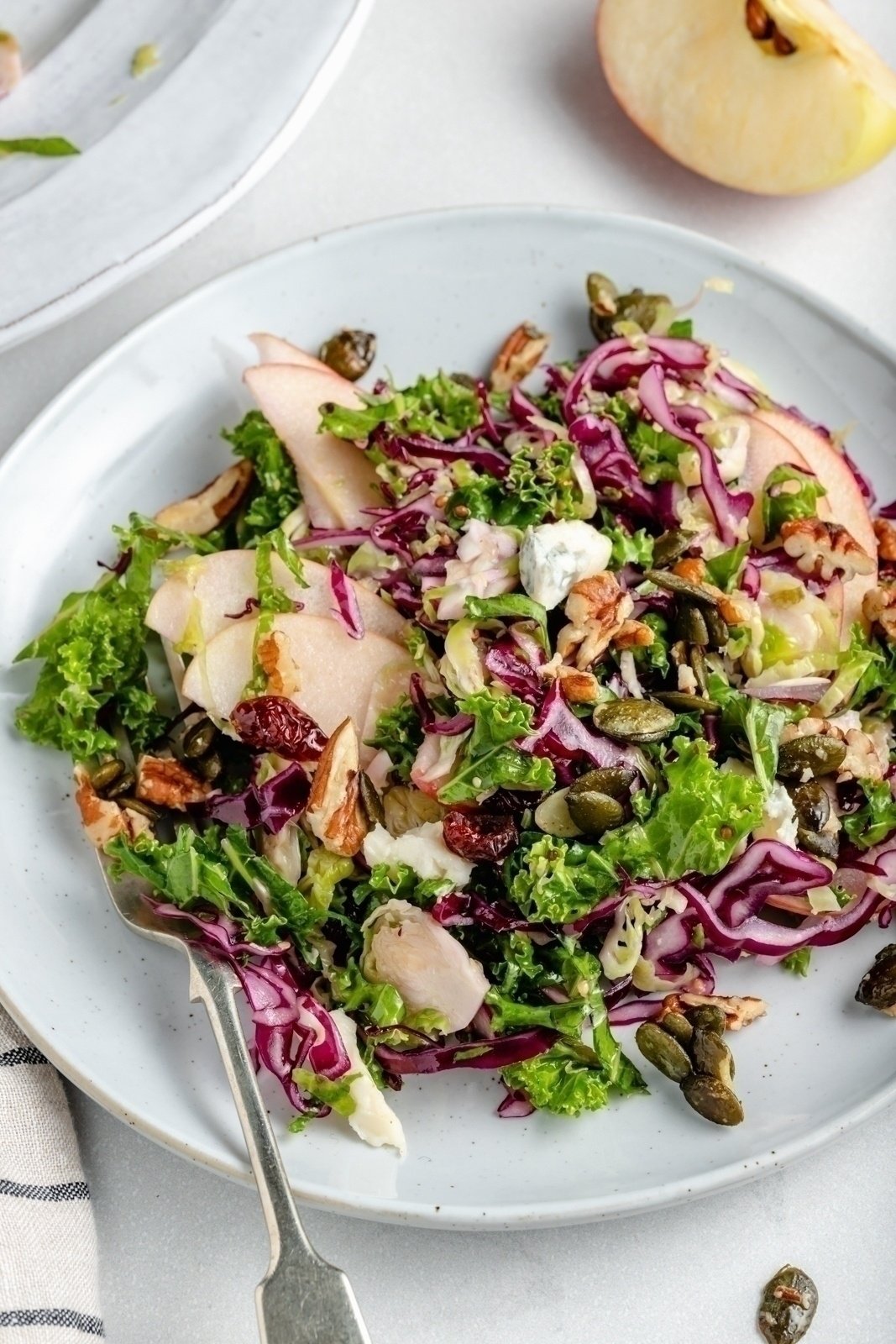 vegetarian kale apple salad on a plate