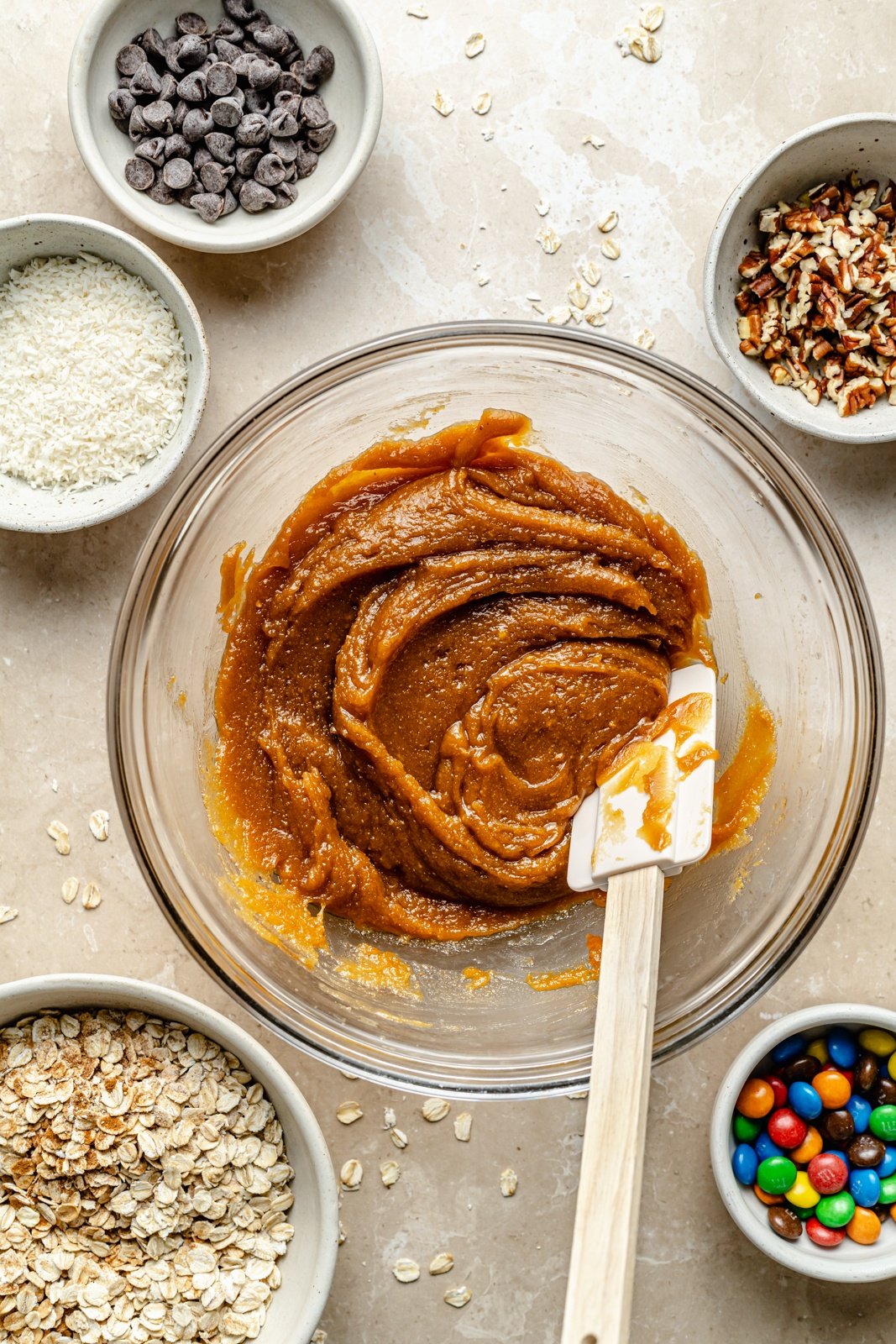 mixing dough for flourless monster cookies