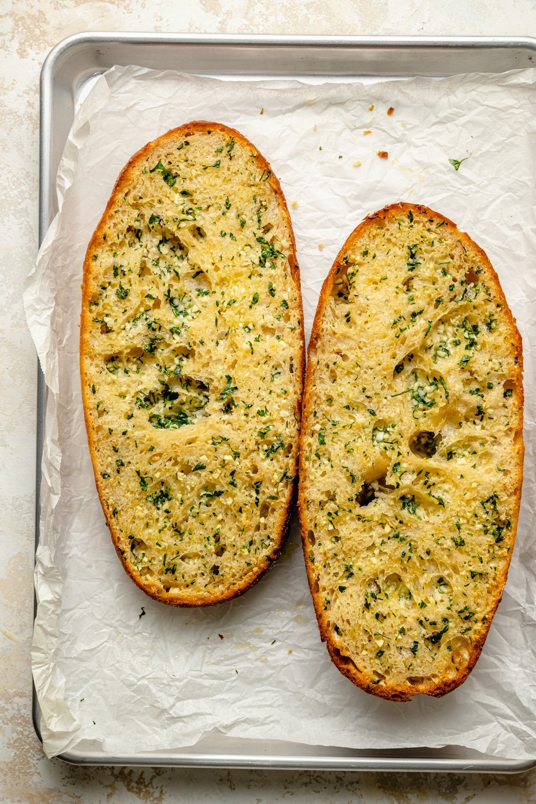 the best garlic bread on a baking sheet