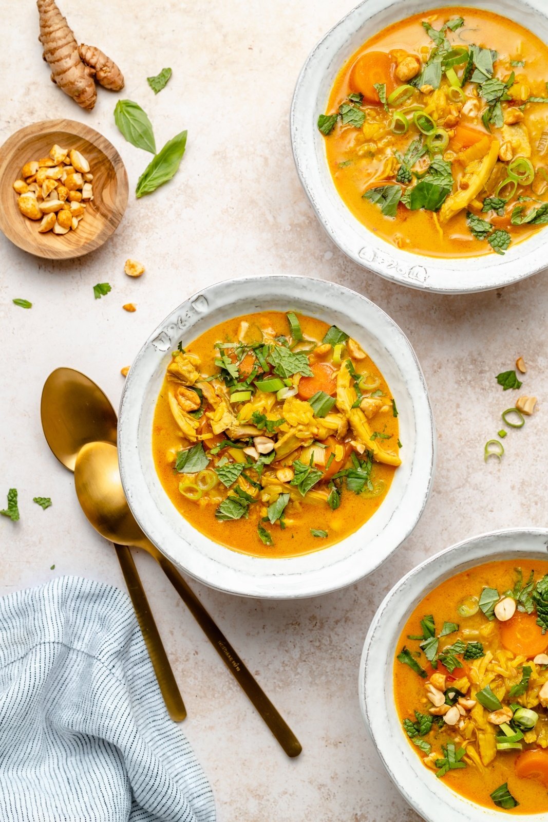 chicken and rice soup in three bowls