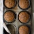 Healthy gingerbread muffins in a muffin tin