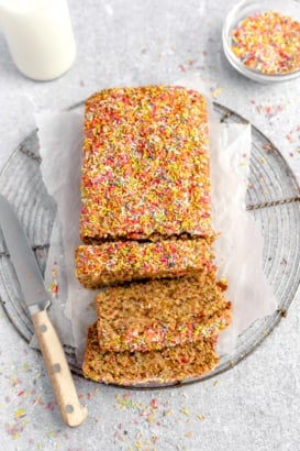 healthy birthday cake bread sliced on a wire rack