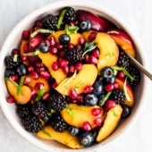 summer peach fruit salad in a bowl