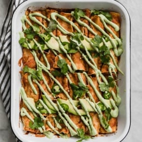 vegan butternut squash enchiladas in a pan