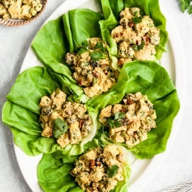 healthy greek yogurt chicken salad in lettuce cups on a platter