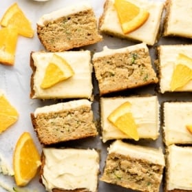 sliced orange zucchini cake on parchment paper