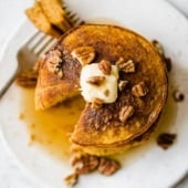 healthy pumpkin oatmeal pancakes in a stack