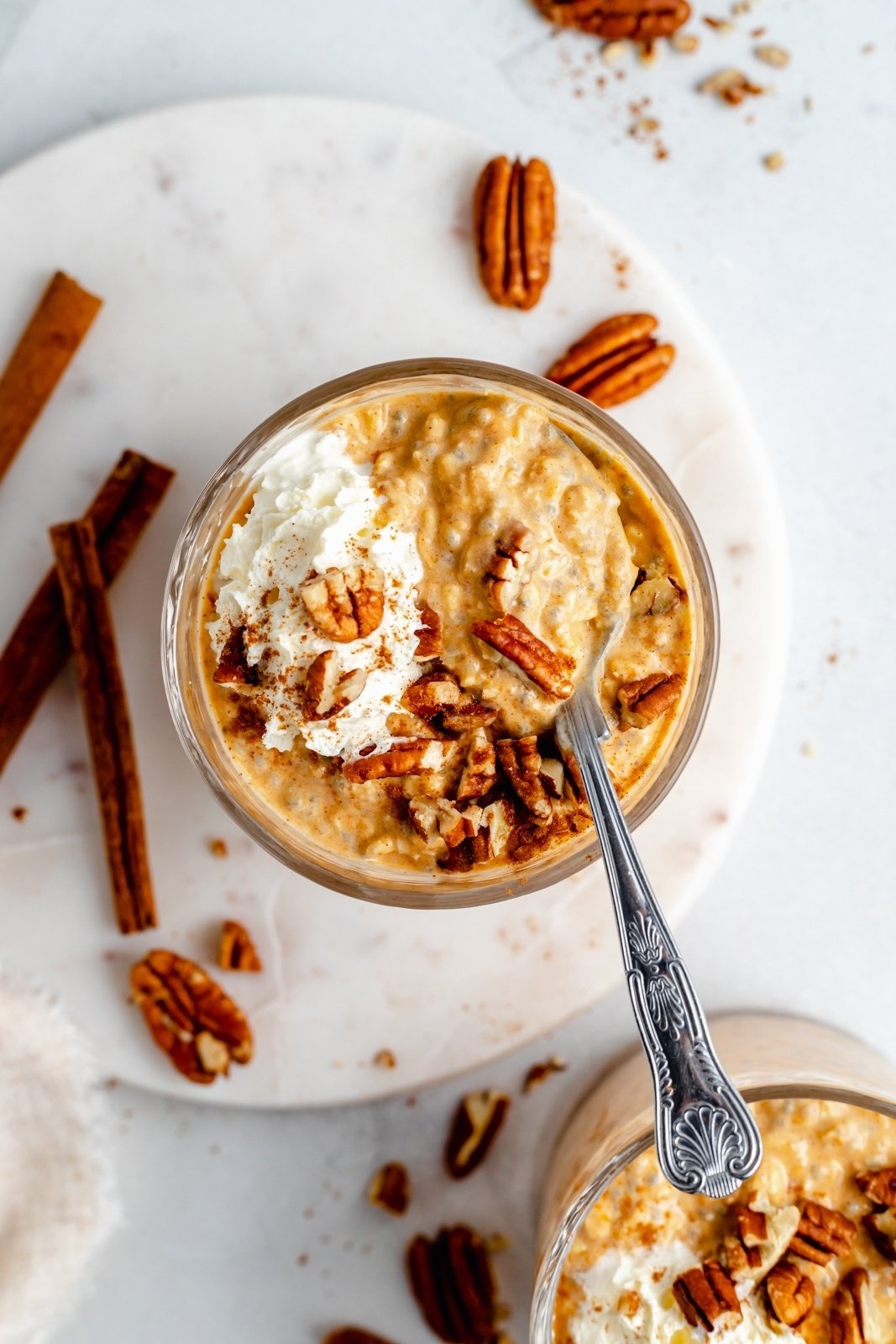 top-down view of pumpkin pie overnight oats in a jar