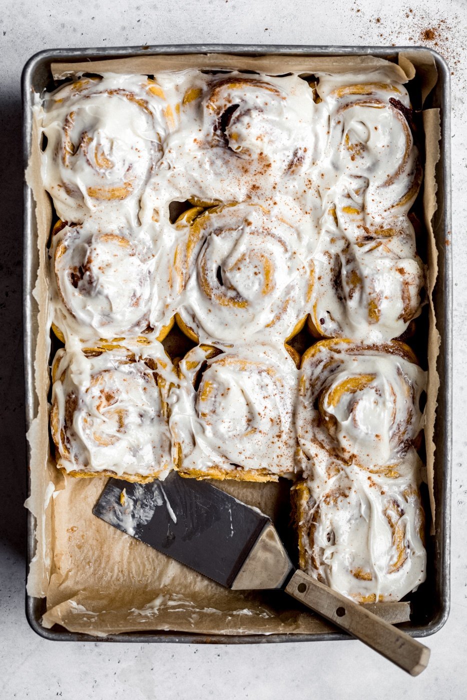 pumpkin cinnamon rolls in a pan