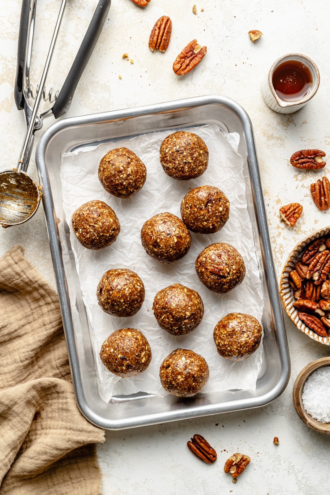 pecan pie energy balls in a metal container