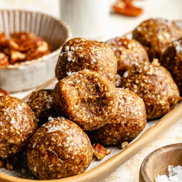 pecan pie energy bites stacked on a plate