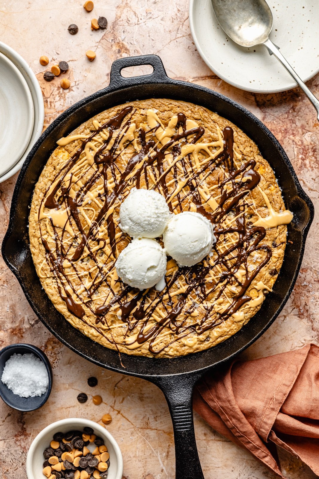 tahini butterscotch cookie skillet topped with vanilla ice cream