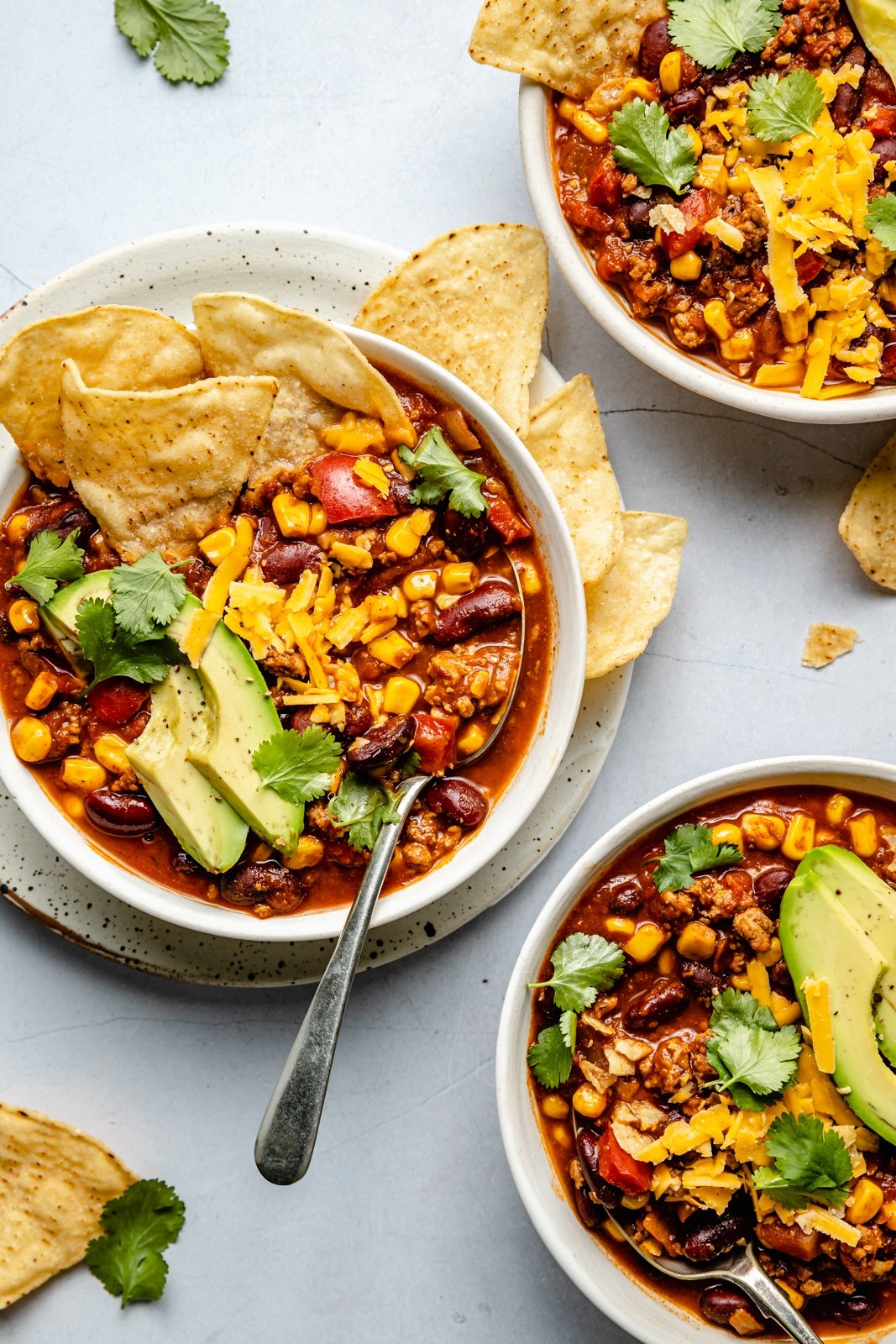 healthy turkey chili in three bowls