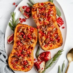 twice baked butternut squash with pecans on a platter